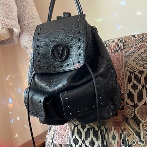 Black pebbled leather Mario Valentino drawstring backpack